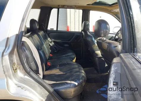 1999 Jeep Grand Cherokee Laredo z USA, uszkodzony, nr VIN 1J4G258S1XC712516